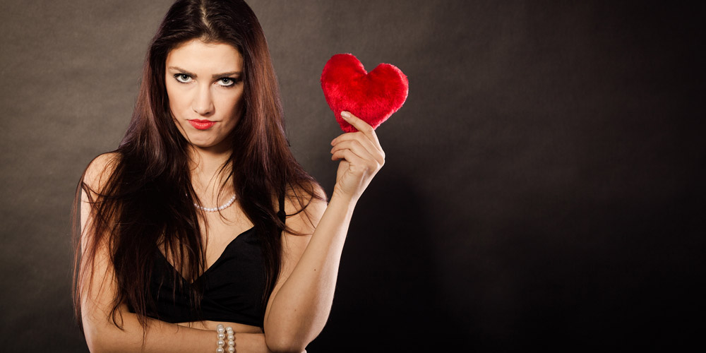 Sad Lovely Woman Holds Red Heart On Black Sad Lovely Woman Holds Red Heart On Black