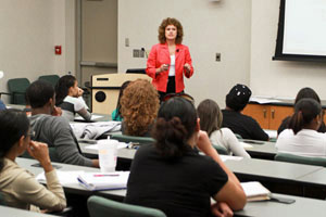 Donna Andersen speaking to college students